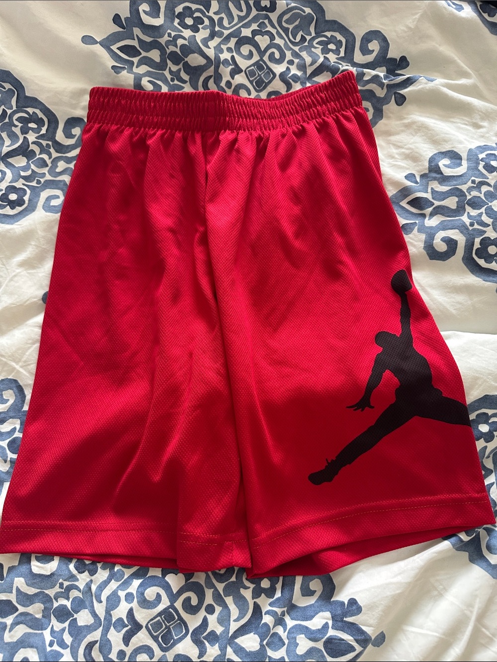 Jordan Red Athletic Shorts with Black Jumpman Tag
